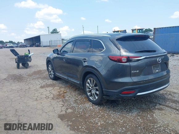 2018 Mazda CX-9 Grand Touring with VIN JM3TCADY7J0217595, listed as a IAAI auction lot 42381331 with 130,604 mi miles and . Bid and sale history available at DreamBid. Image 3.