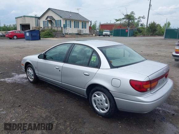 2002 Saturn SL z VIN 1G8ZK52762Z131497, wystawiony jako IAAI lot #42086108 z przebiegiem 119 273 mil mil oraz . Historia ofert i sprzedaży dostępna na DreamBid. Obrazek 3.