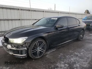 2018 BMW 7 Series 740e xDrive iPerformance with VIN WBA7J2C59JG938180, listed as a Copart auction lot 85343184 with 35,860 mi miles and Salvage Title. Bid and sale history available at carsss.com. Image 1.