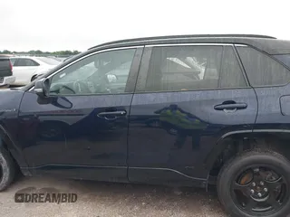 2021 Toyota RAV4 Hybrid XSE with VIN 2T3E6RFV5MW002856, listed as a IAAI auction lot 42387921 with Not provided miles and . Bid and sale history available at DreamBid. Image 13.