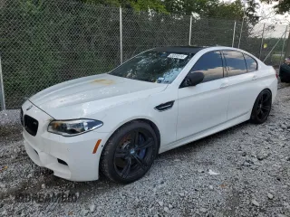 2015 BMW M5 with VIN WBSFV9C5XFD595229, listed as a Copart auction lot 63020514 with 0 mi miles and Salvage Title. Bid and sale history available at carsss.com. Image 1.