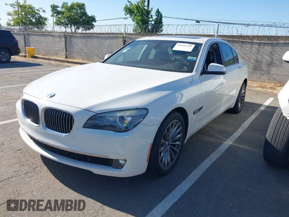 2012 BMW 7 Series 740i with VIN WBAKA4C51CDS99206, listed as a IAAI auction lot 42555719 with 104,303 mi miles and . Bid and sale history available at DreamBid. Image 2.