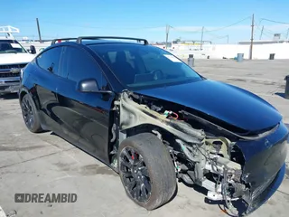 2021 Tesla Model Y Performance with VIN 5YJYGDEF9MF251738, listed as a IAAI auction lot 41708950 with 61,248 mi miles and . Bid and sale history available at DreamBid. Image 6.