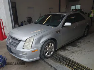 2011 Cadillac STS RWD with VIN 1G6DW6ED4B0120517, listed as a IAAI auction lot 41765069 with 120,059 mi miles and . Bid and sale history available at DreamBid. Image 6.