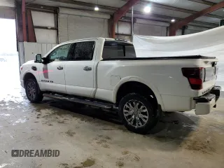 2017 Nissan Titan Pro-4X with VIN 1N6BA1F46HN574314, listed as a Copart auction lot 55573985 with 98,812 mi miles and Salvage title. Bid and sale history available at DreamBid. Image 2.