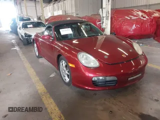 2006 Porsche Boxster z VIN WP0CA29806S710303, wystawiony jako IAAI lot #42276368 z przebiegiem 73 796 mil mil oraz . Historia ofert i sprzedaży dostępna na DreamBid. Obrazek 1.