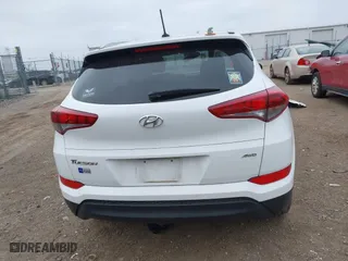 2016 Hyundai Tucson SE with VIN KM8J3CA46GU105087, listed as a IAAI auction lot 40978420 with 103,527 mi miles. Bid and sale history available at carsss.com. Image 16.