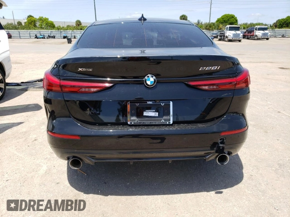 2021 BMW 2 Series 228i xDrive with VIN WBA73AK00M7G62490, listed as a Copart auction lot 50258593 with 15,613 mi miles. Bid and sale history available at carsss.com. Image 6.