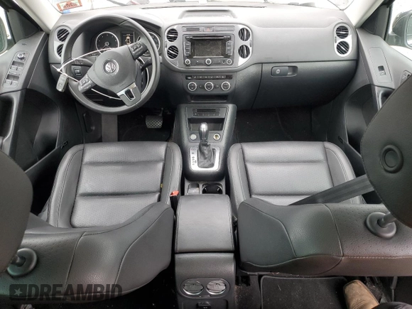 2014 Volkswagen Tiguan S z VIN WVGBV3AX5EW554500, wystawiony jako Copart lot #57016775 z przebiegiem 91 101 mil mil oraz Szkoda całkowita • Salvage title. Historia ofert i sprzedaży dostępna na DreamBid. Obrazek 8.