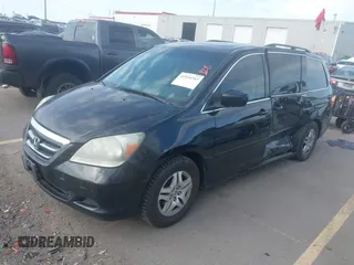 2007 Honda Odyssey EX-L with VIN 5FNRL38627B041332, listed as a IAAI auction lot 41934767 with 234,332 mi miles and . Bid and sale history available at carsss.com. Image 17.