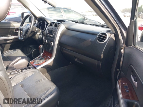 2006 Suzuki Grand Vitara Luxury z VIN JS3TE947864103082, wystawiony jako IAAI lot #42470917 z przebiegiem 155 702 mil mil oraz . Historia ofert i sprzedaży dostępna na DreamBid. Obrazek 5.