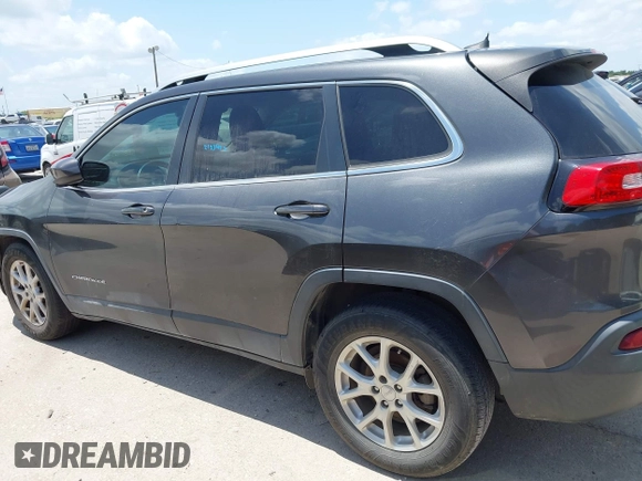 2016 Jeep Cherokee Latitude with VIN 1C4PJLCBXGW265431, listed as a IAAI auction lot 42542328 with 127,249 mi miles and . Bid and sale history available at DreamBid. Image 14.