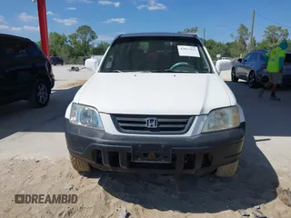 1999 Honda CR-V EX with VIN JHLRD1860XC037846, listed as a IAAI auction lot 42037921 with 164,477 mi miles. Bid and sale history available at carsss.com. Image 6.