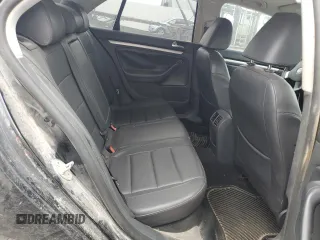 2009 Volkswagen Jetta SE with VIN 3VWRM71K49M172348, listed as a Copart auction lot 60603895 with 129,515 mi miles and Salvage title. Bid and sale history available at DreamBid. Image 10.