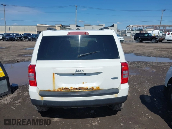 2014 Jeep Patriot Latitude with VIN 1C4NJPFA8ED550221, listed as a IAAI auction lot 41919419 with 185,386 mi miles and . Bid and sale history available at carsss.com. Image 16.