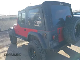 1997 Jeep Wrangler SE z VIN 1J4FY29PXVP476036, wystawiony jako IAAI lot #41882559 z przebiegiem 82 888 mil mil oraz . Historia ofert i sprzedaży dostępna na DreamBid. Obrazek 14.