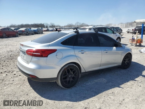 2016 Ford Focus SE with VIN 1FADP3F24GL267194, listed as a Copart auction lot 48812385 with 154,466 mi miles and Salvage Title. Bid and sale history available at carsss.com. Image 3.