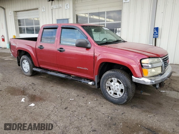 2005 GMC Canyon 1SE SLE Z71 with VIN 1GTDS136858199034, listed as a Copart auction lot 49888385 with 227,076 mi miles and Salvage Title. Bid and sale history available at carsss.com. Image 4.