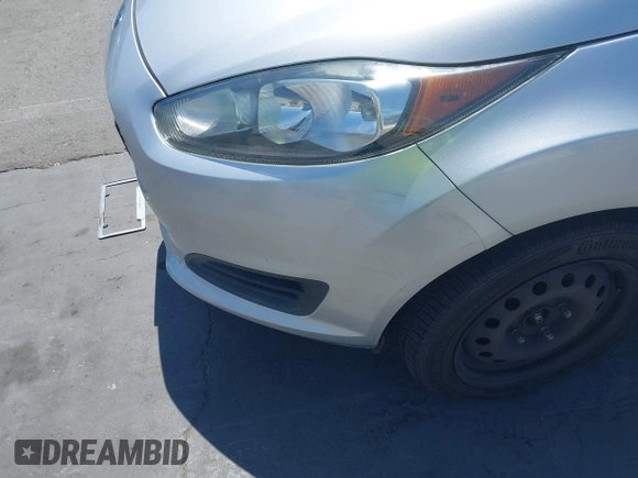 2014 Ford Fiesta S z VIN 3FADP4AJ0EM102338, wystawiony jako IAAI lot #42670979 z przebiegiem 141 301 mil mil oraz . Historia ofert i sprzedaży dostępna na DreamBid. Obrazek 12.