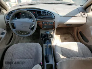 2000 Mercury Mystique GS z VIN 1MEFM6530YK615859, wystawiony jako Copart lot #59704875 z przebiegiem 259 272 mil mil oraz Szkoda całkowita • Salvage title. Historia ofert i sprzedaży dostępna na DreamBid. Obrazek 8.