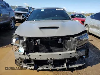 2023 Dodge Charger GT with VIN 2C3CDXHG0PH670993, listed as a Copart auction lot 48915405 with 7,740 mi miles and Salvage Title. Bid and sale history available at DreamBid. Image 5.