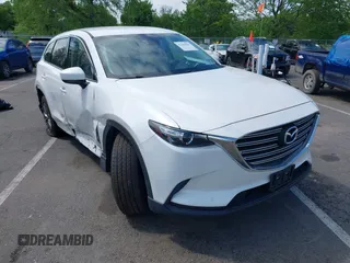 2017 Mazda CX-9 Touring z VIN JM3TCBCY1H0127280, wystawiony jako IAAI lot #42205019 z przebiegiem 103 858 mil mil oraz . Historia ofert i sprzedaży dostępna na DreamBid. Obrazek 1.