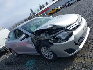 2014 Toyota Camry L with VIN 4T4BF1FK8ER419012, listed as a IAAI auction lot 41819331 with 84,372 mi miles and . Bid and sale history available at DreamBid. Image 14.