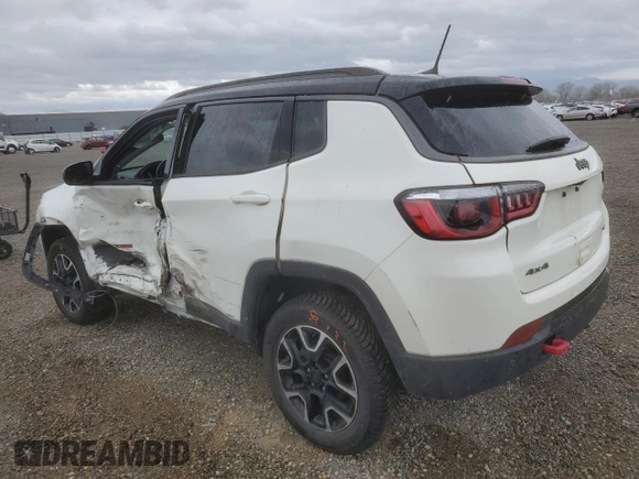 2019 Jeep Compass Trailhawk with VIN 3C4NJDDB4KT790351, listed as a Copart auction lot 48588285 with 67,417 mi miles and Salvage Title. Bid and sale history available at DreamBid. Image 2.