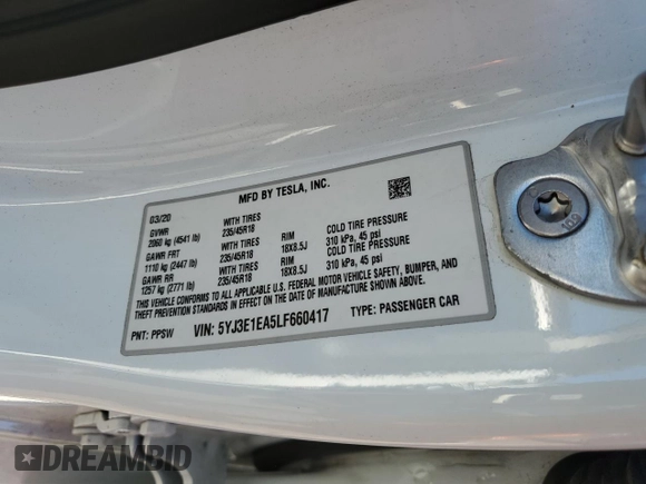 2020 Tesla Model 3 Standard Range Plus with VIN 5YJ3E1EA5LF660417, listed as a Copart auction lot 48144125 with 112,924 mi miles and Salvage Title. Bid and sale history available at DreamBid. Image 15.