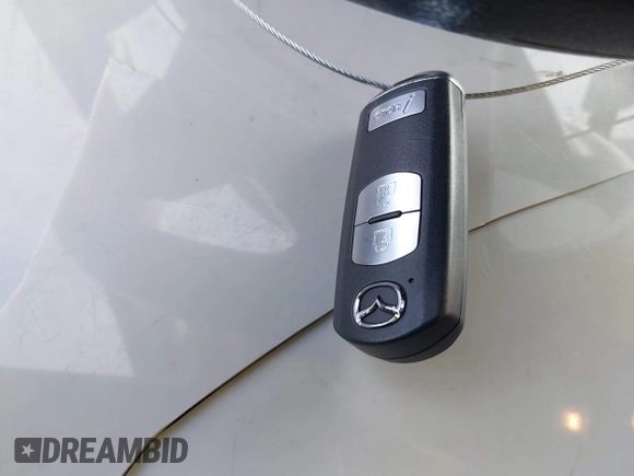 2016 Mazda 3 i Sport with VIN 3MZBM1K73GM245859, listed as a IAAI auction lot 41378710 with 65,414 mi miles and . Bid and sale history available at DreamBid. Image 11.