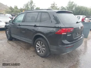 2018 Volkswagen Tiguan S with VIN 3VV1B7AX0JM101932, listed as a IAAI auction lot 41725112 with 143,780 mi miles. Bid and sale history available at carsss.com. Image 3.