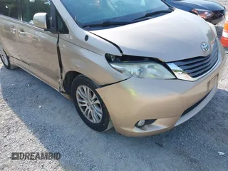 2011 Toyota Sienna XLE AAS with VIN 5TDYK3DC7BS008535, listed as a IAAI auction lot 42589645 with 208,624 mi miles and . Bid and sale history available at DreamBid. Image 6.