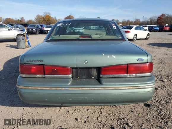 1997 Ford Crown Victoria с VIN 2FALP73W6VX173232, выставлен на аукционе Copart как лот 77805094 с пробегом 228 871 миль миль и Списание • Salvage title. История ставок и продаж доступна на DreamBid. Изображение 6.