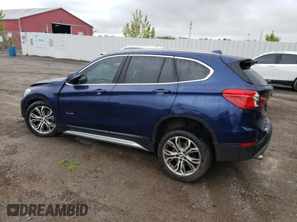 2018 BMW X1 xDrive28i with VIN WBXHT3C35J5F88893, listed as a Copart auction lot 58032725 with 143,968 mi miles and Salvage title. Bid and sale history available at DreamBid. Image 2.