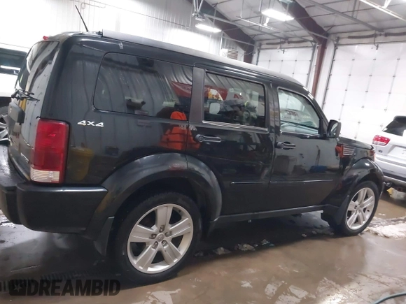 2011 Dodge Nitro Heat with VIN 1D4PU4GK1BW602572, listed as a IAAI auction lot 41529030 with 134,482 mi miles. Bid and sale history available at carsss.com. Image 13.