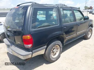 1998 Ford Explorer XL z VIN 1FMZU34X4WUC94388, wystawiony jako IAAI lot #42822057 z przebiegiem 232 117 mil mil oraz . Historia ofert i sprzedaży dostępna na DreamBid. Obrazek 4.