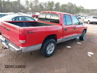 2001 Dodge Dakota Sport with VIN 1B7HL2AN71S275418, listed as a IAAI auction lot 41256157 with 252,468 mi miles. Bid and sale history available at carsss.com. Image 4.