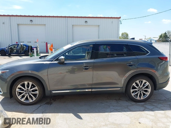 2016 Mazda CX-9 Signature with VIN JM3TCBEY2G0124433, listed as a IAAI auction lot 42194154 with 108,945 mi miles and . Bid and sale history available at DreamBid. Image 14.