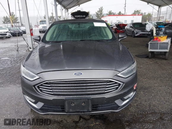 2017 Ford Fusion Titanium with VIN 3FA6P0SU8HR329570, listed as a IAAI auction lot 41773023 with 112,022 mi miles and . Bid and sale history available at DreamBid. Image 13.