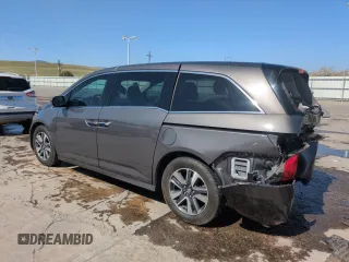2014 Honda Odyssey Touring with VIN 5FNRL5H95EB052523, listed as a Copart auction lot 52214055 with 131,350 mi miles and Salvage Title. Bid and sale history available at DreamBid. Image 2.