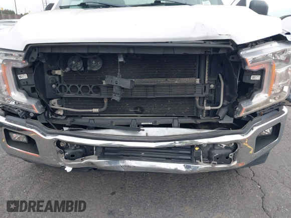 2018 Ford F-150 XL with VIN 1FTEW1CB4JKC87131, listed as a IAAI auction lot 42120579 with 93,143 mi miles. Bid and sale history available at carsss.com. Image 6.