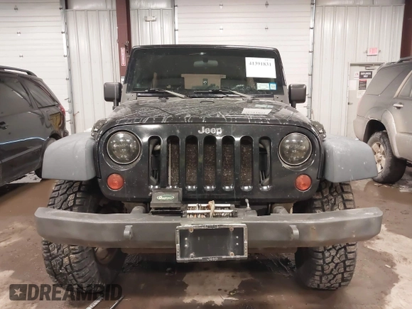 2008 Jeep Wrangler Unlimited X with VIN 1J4GA39178L619031, listed as a IAAI auction lot 41391831 with 177,600 mi miles and . Bid and sale history available at DreamBid. Image 12.