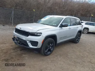 2023 Jeep Grand Cherokee Laredo with VIN 1C4RJHAG2PC660418, listed as a IAAI auction lot 41693879 with 4,295 mi miles and . Bid and sale history available at DreamBid. Image 21.