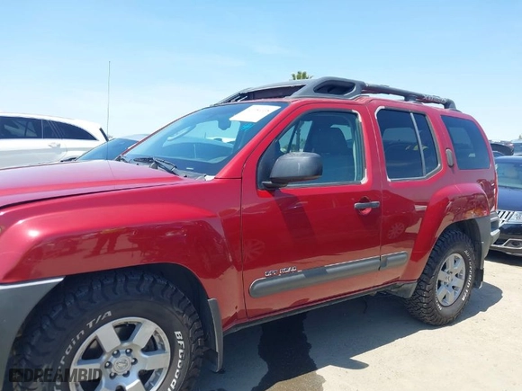 2005 Nissan Xterra S with VIN 5N1AN08U35C616998, listed as a IAAI auction lot 41954338 with 136,126 mi miles. Bid and sale history available at carsss.com. Image 14.