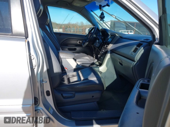 2006 Honda Pilot EX-L with VIN 5FNYF18786B030253, listed as a IAAI auction lot 41708620 with 146,713 mi miles and . Bid and sale history available at DreamBid. Image 5.