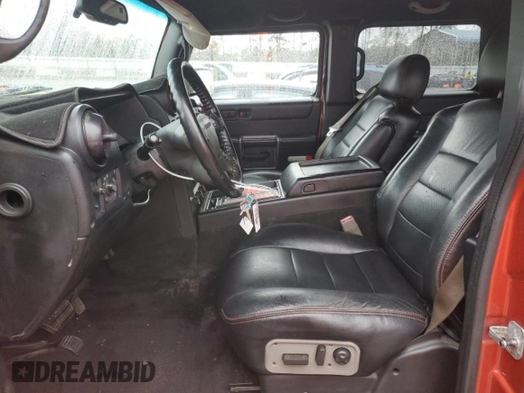 2003 Hummer H2 with VIN 5GRGN23U33H136931, listed as a Copart auction lot 80671794 with 127,137 mi miles and Salvage Title. Bid and sale history available at carsss.com. Image 7.