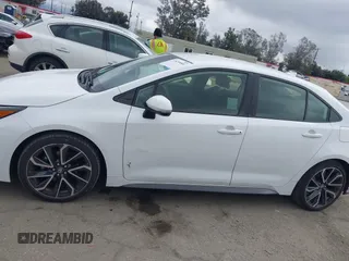 2022 Toyota Corolla SE with VIN JTDS4MCE4N3502754, listed as a IAAI auction lot 41879980 with 23,722 mi miles. Bid and sale history available at carsss.com. Image 14.