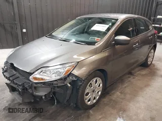 2012 Ford Focus SE with VIN 1FAHP3K22CL394088, listed as a IAAI auction lot 40953085 with 147,259 mi miles and . Bid and sale history available at carsss.com. Image 2.