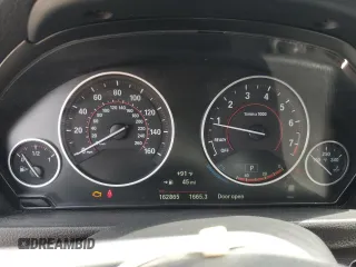 2017 BMW 3 Series 330i xDrive with VIN WBA8D9G56HNU59185, listed as a Copart auction lot 57411935 with 162,865 mi miles and Salvage title. Bid and sale history available at DreamBid. Image 9.