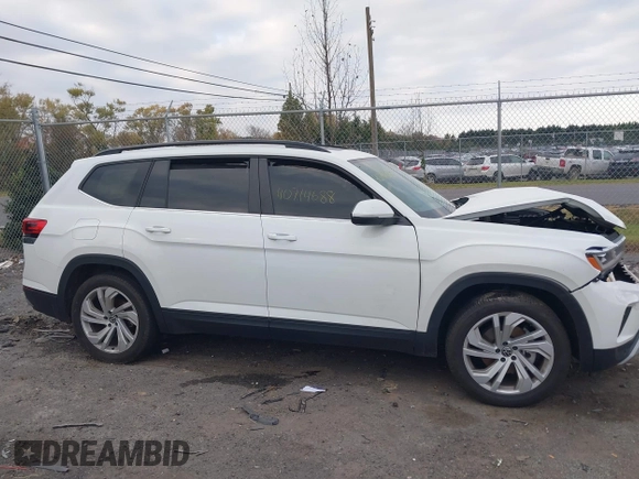 2023 Volkswagen Atlas SE with VIN 1V2KP2CA9PC556898, listed as a IAAI auction lot 40714688 with 53,598 mi miles and . Bid and sale history available at DreamBid. Image 13.